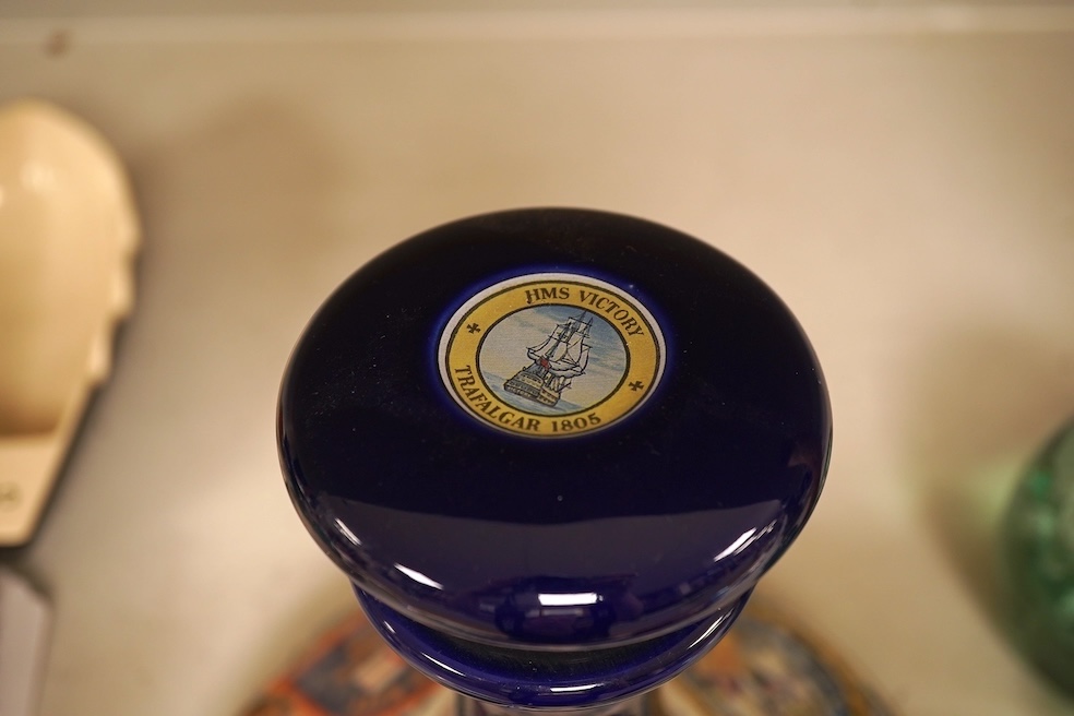 Wade 'Purser's Navy Rum Decanter' and two Captain Morgan rum boat ashtrays, decanter 24cm high
